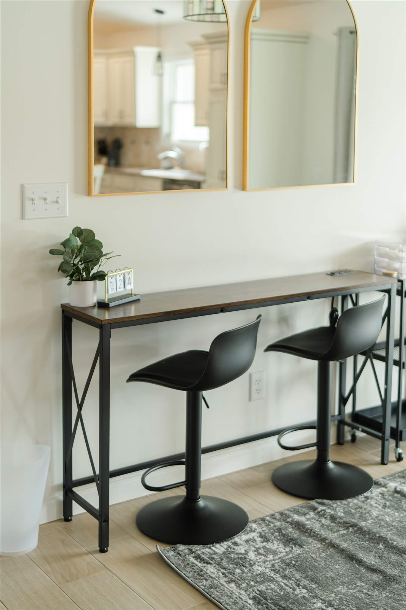 Two Glam Suite beauty stations with arched mirrors