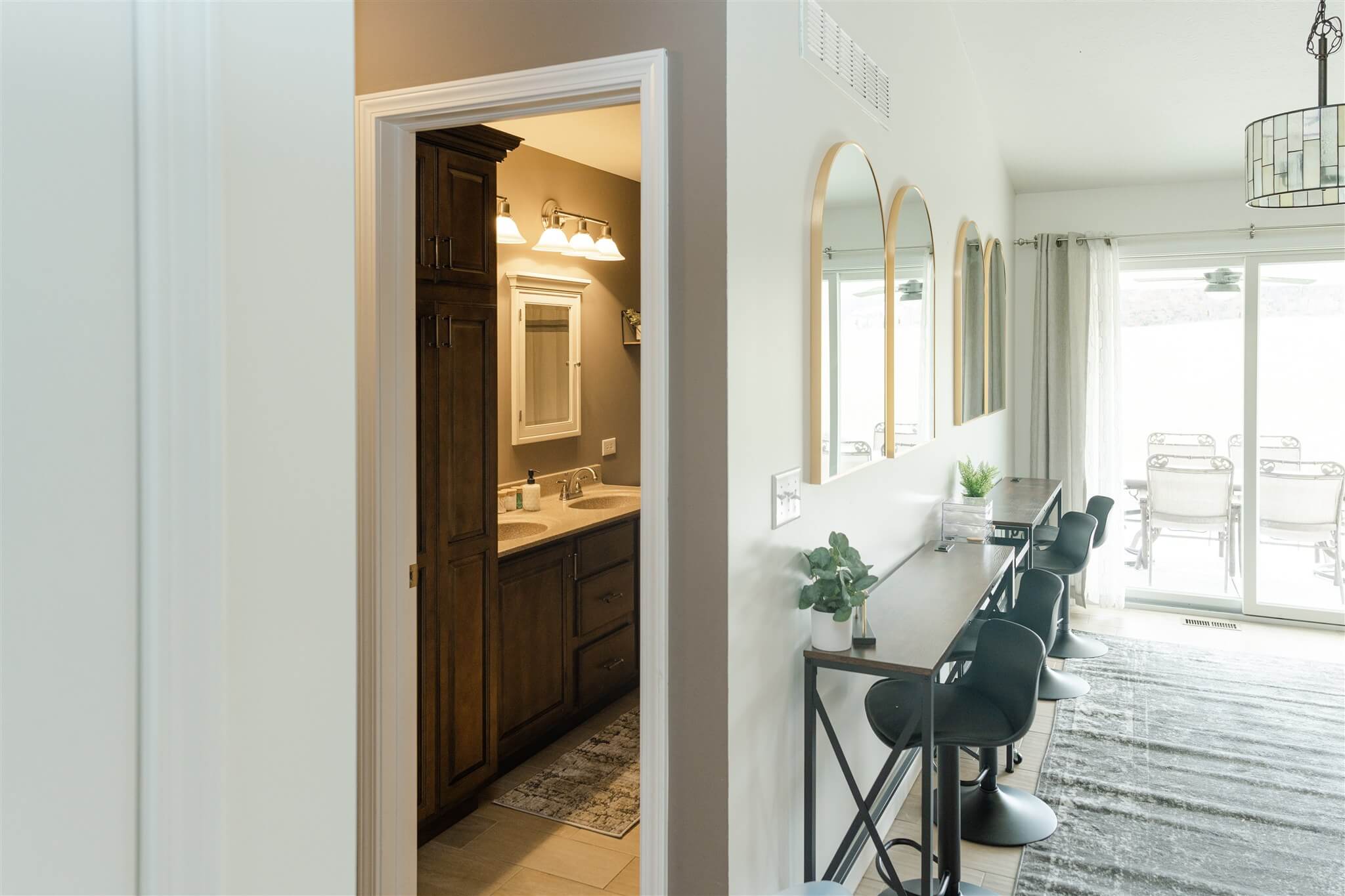 Beauty stations beside bathroom entrance