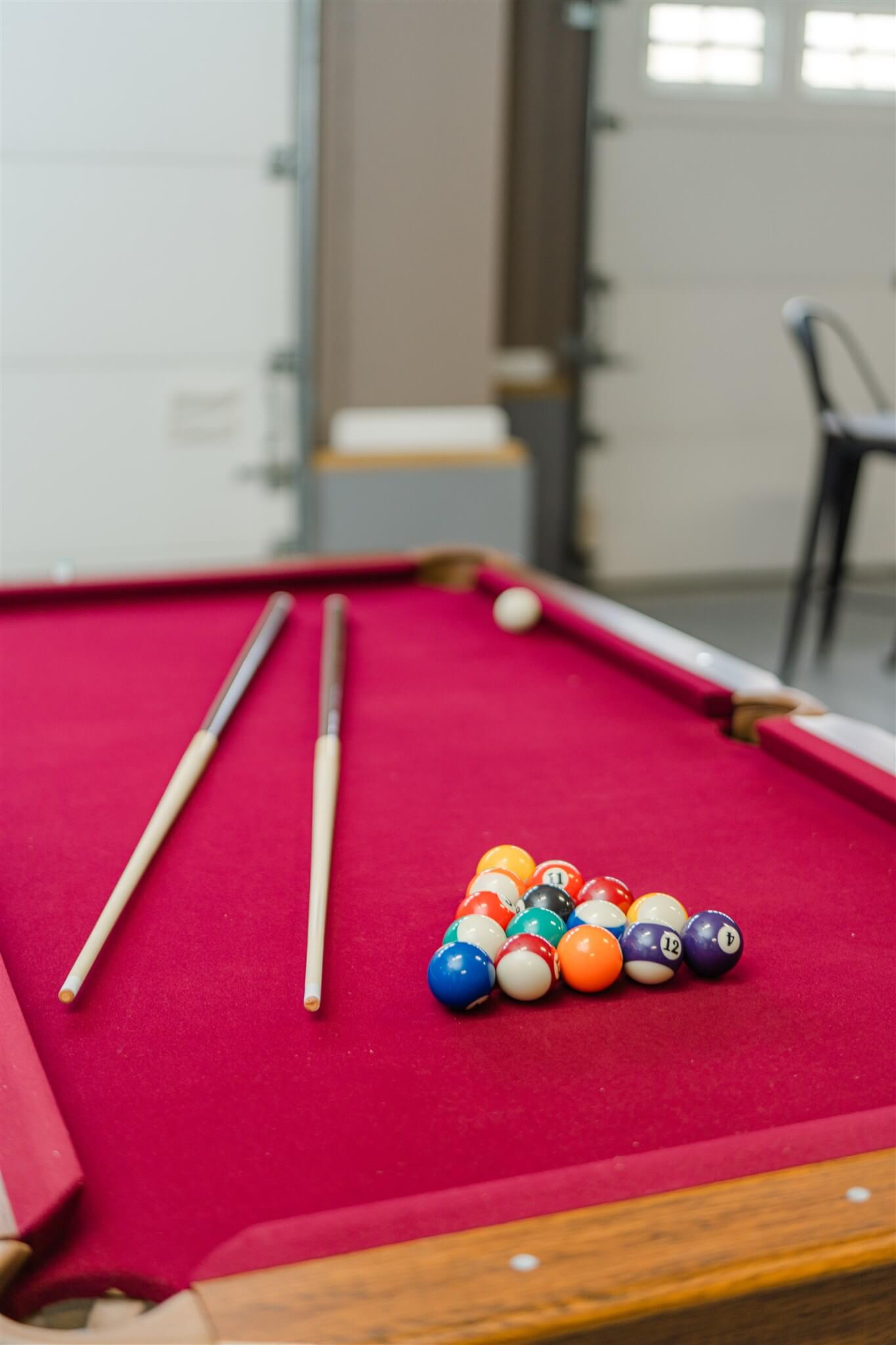 Pool table ready for play in garage lounge